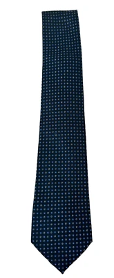 CORBATA DE SIERRA - MEZCLA DE POLIÉSTER Y SEDA - AZUL MARINO CON PUNTOS AZULES Y PLATEADOS Foto 1 de 4