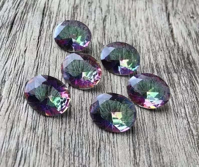 Wholesale Natural Mystic Quartz Oval Faceted Cut Gemstones AAA Grade Stones - Image 1 of 4