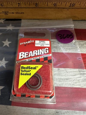 Dynamite. DYN3021 3/8" X 5/8" Outdrive Teflon Sealed for: RC10 - Image 1 of 3