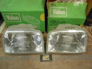 04P11 JUEGO FAROS H4 RENAULT SUPERCINCO REGULACIÓN POR CABLE VALEO 061306-061307 - Imagen 1 de 2