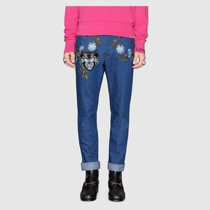 gucci jeans with writing