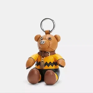 Coach x Peanuts Charlie Brown Bear Collectible Bag Charm NWT - Picture 1 of 8