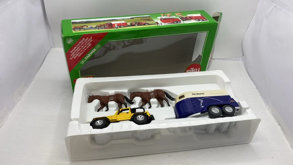 SIK4670 Siku Jeep con cavalli rimorchio per cavalli 1/32 - Immagine 1 di 2