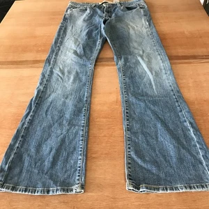 Levi's 519 Flare Jeans Women 11M Blue Mid Rise Medium Wash Stretch Skater Grunge - Picture 1 of 12