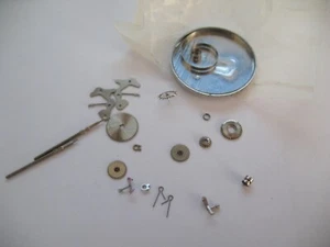 UNIVERSAL 330 ASSORTED WATCH MOVEMENT PARTS - Picture 1 of 15
