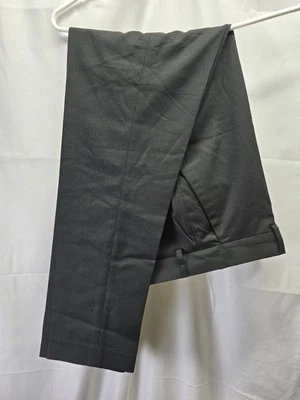 Pantalón de vestir para hombre Asos negro a medida cintura plisado frontal con bolsillo. 32x32 Foto 1 de 4