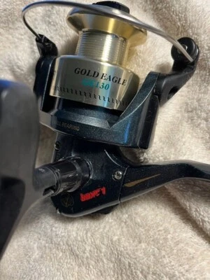 NOS GOLD EAGLE GE130 LAKER SPINNING FISHING REEL - Unused W/O BOX - Image 1 of 4