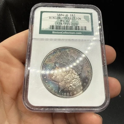 Dólar de plata Morgan 1884 O NGC MS62 $1 MS-62 colección Binion tono salvaje Foto 1 de 4