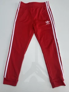 Pantaloni tuta Adidas Superstar Adicolour. Rosso, età 9-10. Taglia In Descrizione - Foto 1 di 4