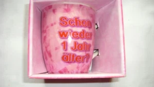 Geschenktasse Geburtstag "Schon wieder ein Jahr älter" pink - Bild 1 von 2
