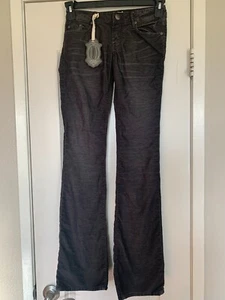 Pantalones de mezclilla de pana ajustados rectos negros talla 24 Stitch's Signature nuevos con etiquetas - Imagen 1 de 5