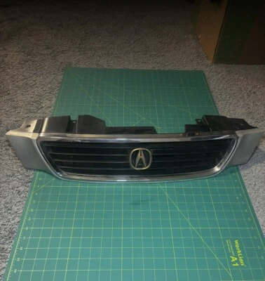 1995-1998 ACURA TL 2,5 L PARACHOQUES DELANTERO REJILLA SUPERIOR CON EMBLEMA DORADO FÁBRICA OEM Foto 1 de 4
