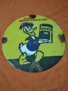 Letrero de bomba de aceite del pato Donald SUNOCO porcelana esmalte 12 x 12 pulgadas - Imagen 1 de 2