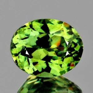 Green Demantoid 0.57 carats Oval 5.5x4.5 mm,Flawless-VVS, Natural Loose Gemstone - Picture 1 of 2