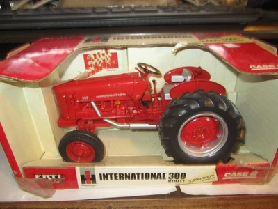 2005 Toy Ertl  1/16 International Harvester 300 Utility Tractor, 3 Millionth NIB - Image 1 of 4