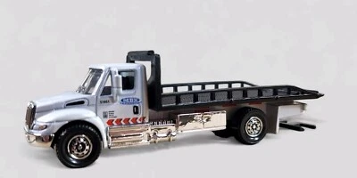 Camión modelo International Durastar 4400 Rollback diorama DieCast 1:64 suelto Foto 1 de 4