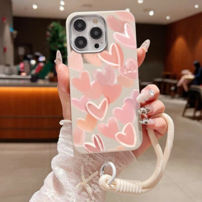Heart Wrist Strap Case For iPhone 16 15Pro Max 14 13 12 11 ShockProof Soft Cover - Image 1 of 4