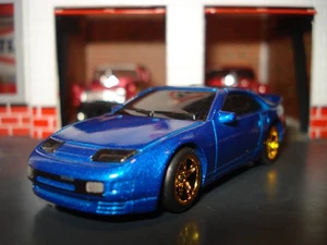 NISSAN 300-ZX CUSTOM EDITION SPORTWAGEN 1/64 HW CUSTOM GOLD RÄDER GUMMIREIFEN - Bild 1 von 4