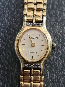 Vintage womens ELGIN QUARTZ watch gold tone metal 7.5 inch runs slow - Picture 1 of 13