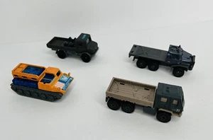 4 Matchbox Toys 2 Jurassic World Transporter & Rig 1 Tank 1 Unimog fehlende Teile  - Bild 1 von 9