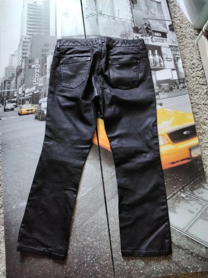 Pantalones de mujer Notify Italy negros de cuero elástico longitud recortada talla 31 nuevos $595 Foto 1 de 4