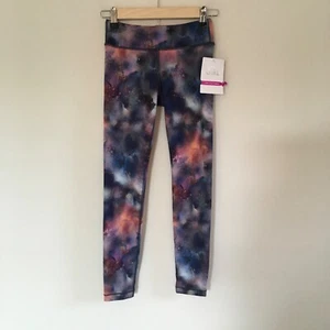 NWT Athleta girl printed chit chat tight leggings L/12 Frozen Floral Outer Space - Picture 1 of 12