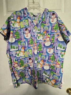 Peaches Scrub Top Size-L-CHRISTMAS Snowman/Trees/Stars-Chest 24" L 28.5" - Image 1 of 4