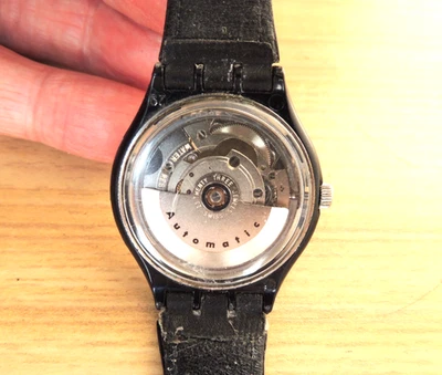 MONTRE SWATCH  AUTOMATIQUE  /  SQUELETTE  BRACELET CUIR  ETAT MOYEN - Photo 1/4