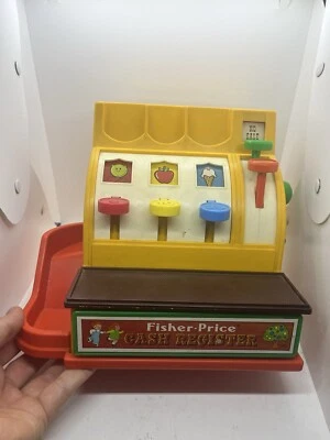 Caja registradora Fisher Price 1974 vintage con 5 monedas de juguete Foto 1 de 4