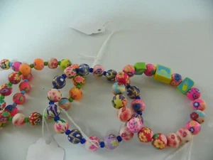 LOT OF 4 NEW HANDMADE MULTI COLOR BEADED STRETCH BRACELETS - Picture 1 of 3