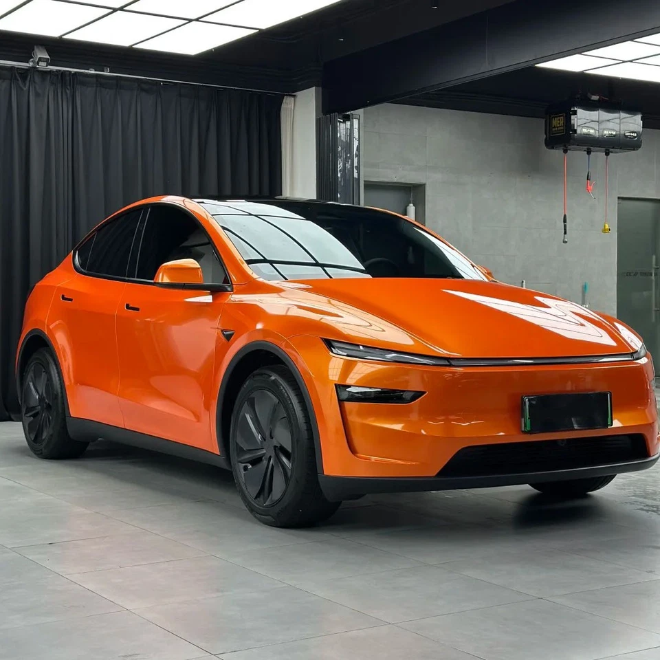 Película de protección de pintura PPF precortada naranja carreras para Tesla modelo Y Juniper 2025 Foto 1 de 4