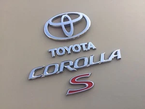 2003-2009 Toyota Corolla S Trunk Emblem Set Logo Badge OEM - Picture 1 of 7