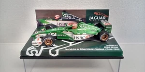 1:43 JAGUAR R1 IRVINE TEST SILVERSTONE JANUARY 2000 with HIS ORIGINAL HELMET - Picture 1 of 4