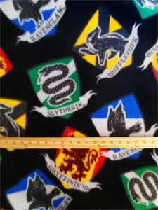 Fleece WARNER BROS.'S HARRY POTTER Print Fabric - COLORFUL CRESTS /58" Wide/ SBY - Picture 1 of 1