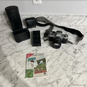 Canon AE-1 Program analoge Spiegelreflexkamera 35mm mit viel Zubehör, getestet funktioniert - Bild 1 von 22