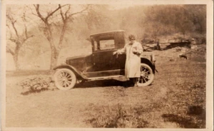 RPPC Lady standing next to antique car postcard a46 - Picture 1 of 2