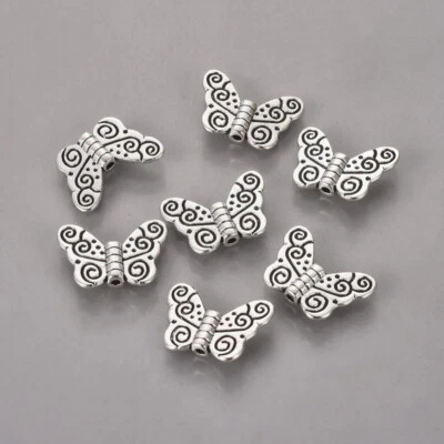 Tibetan Silver Spacer Beads Butterfly Spiral Pattern 15mm x 11mm 25pcs SPB19 - Image 1 of 2