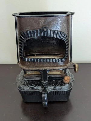 Estufa de campamento de hierro triste #1 muy ornamentada Taylor & Boggis Summer Girl sin marca Foto 1 de 4