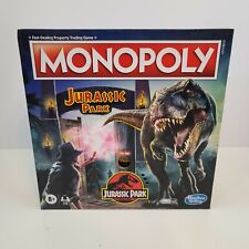 Gra planszowa Hasbro Monopoly Jurassic Park Edition (nowa/zapieczętowana) Zabezpiecz park
