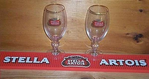 STELLA ARTOIS CERVEZA BAR RIEL ALFOMBRA MONTAÑA RUSA Y 2 VASOS DE CÁLIZ 33cl NUEVO - Imagen 1 de 1