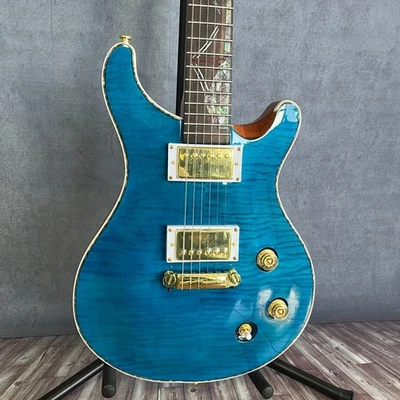 PRS Custom 24 - Tastiera in palissandro corpo mogano intarsi uccellino fiamma blu - Immagine 1 di 4