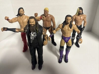 Lote de 5 WWE Seth Rollins, Bray Wyatt, Shinsuke Nakamura, Adrian Neville, Rikishi Foto 1 de 4