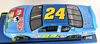 2000 REVELL 1/18 JEFF GORDON #24 PEANUTS 50TH CELEBRATION CHEVY DIECAST REPLICA - Image 1 of 4