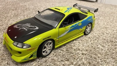 Racing Champions Rápido y Furioso Paul Walker 1995 Mitsubishi Eclipse escala 1/18 Foto 1 de 4