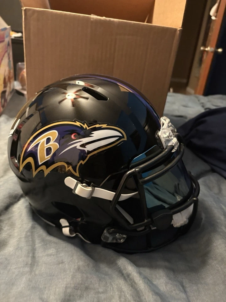 Casco de fútbol americano réplica firmado por Ed Reed Baltimore Ravens Foto 1 de 4