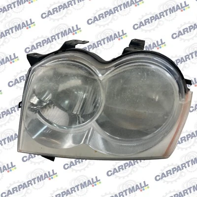 05-07 Faro delantero izquierdo lado conductor Jeep Grand Cherokee 55156351AG Foto 1 de 4