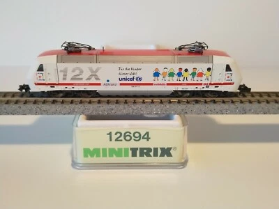 LOCOMOTORA ELÉCTRICA BR 128 001 12x UNICEF MINITRIX 12694 (F064) - Imagen 1 de 4