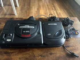 Sega Genesis Model 1 Console w/ Sega CD 2 Bundle. Console Works, CD Untested.