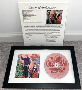 ELTON JOHN SIGNED MERRY CHRISTMAS CD COVER FRAMED YELLOW BRICK ROAD JSA - Picture 1 of 3