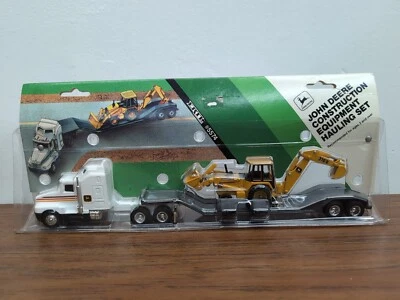 1/64 Ertl John Deere Backhoe 310 D Construction  Equipment Hauling Set - Image 1 of 2
